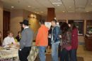 Students arriving from close to 20 campuses register for the Shabbaton in the main lobby.