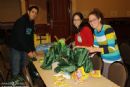Josh, Rachel & Lauren, pose for a shot while packing welcome kits for the hundreds of students.