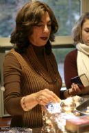Mrs. Malka Werde (FIT) leads the Shababt Candle Lighting ceremony.